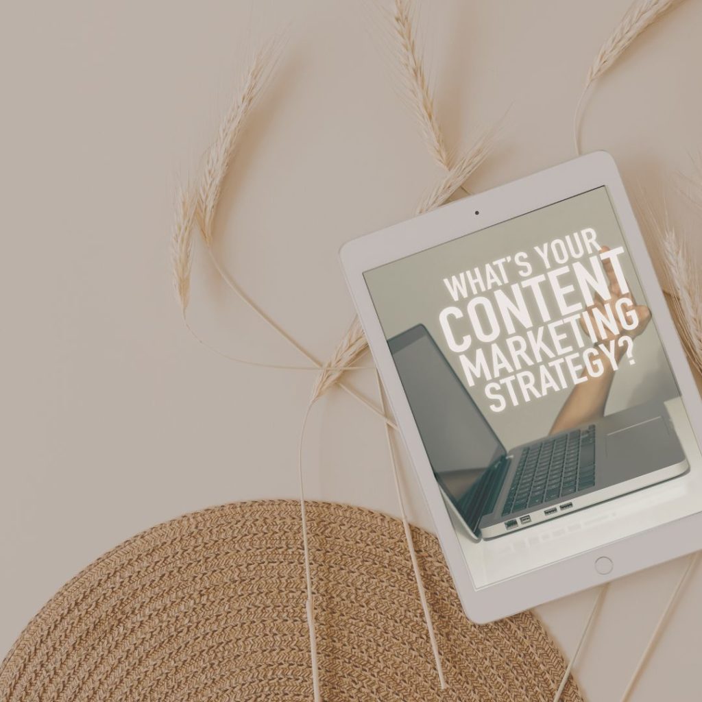 Tablet on neutral background with "Content and Marketing" on the screen