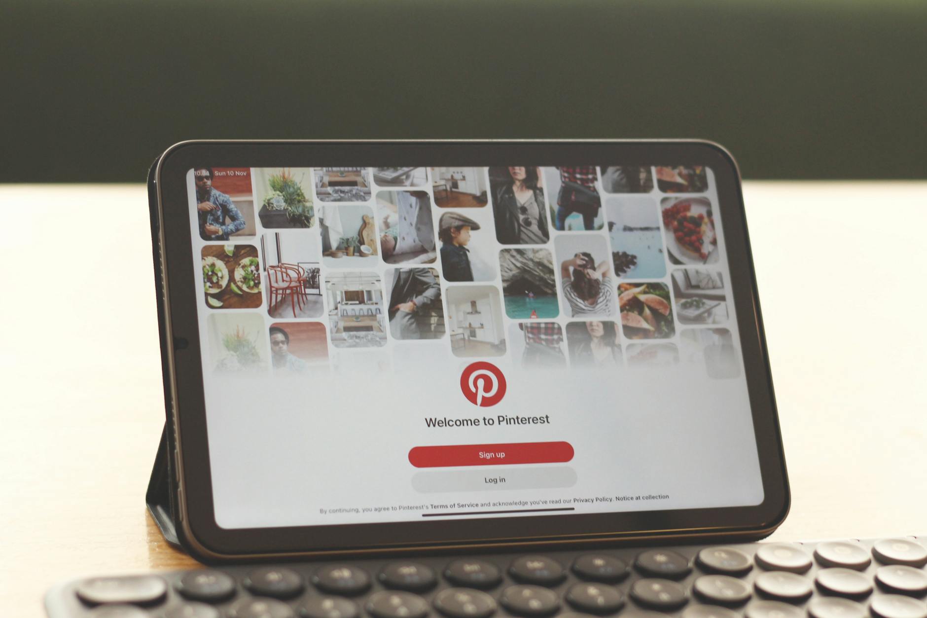 digital tablet displaying pinterest on desk