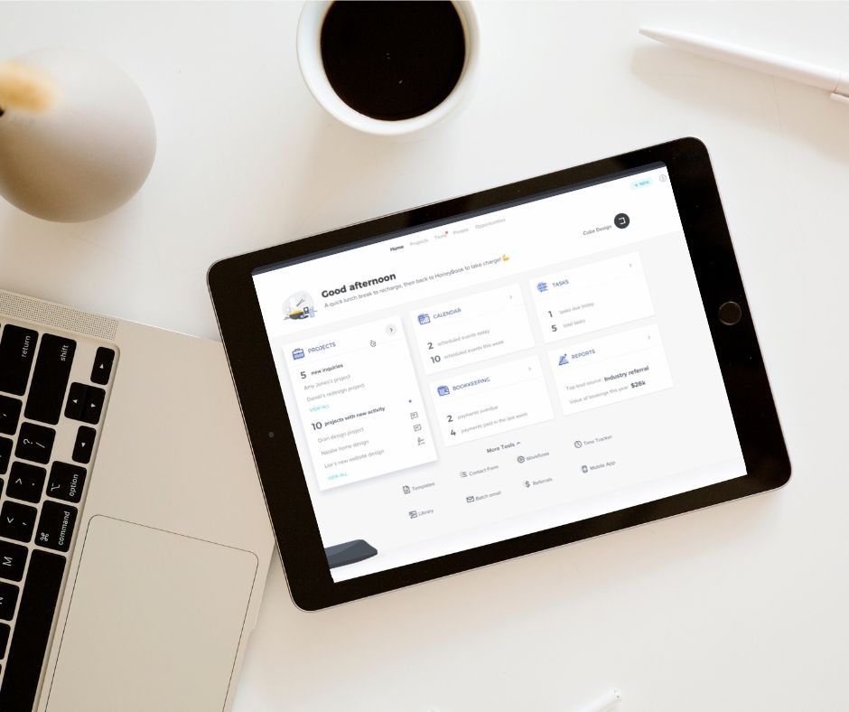 Female photographer organizing client workflows with HoneyBook
